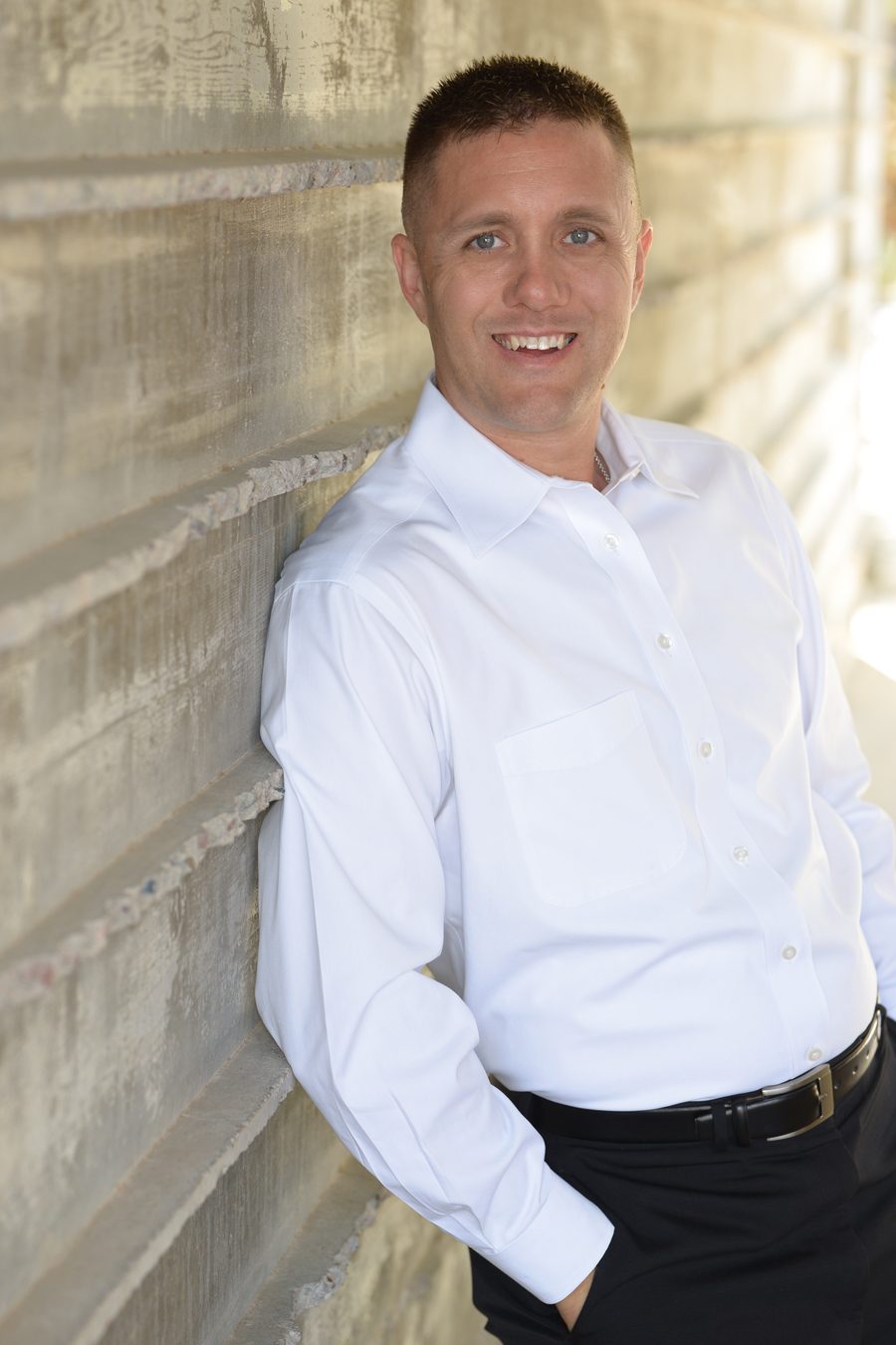 Jon Hegreness, REALTOR and Associate Broker with Howe Realty, standing portrait